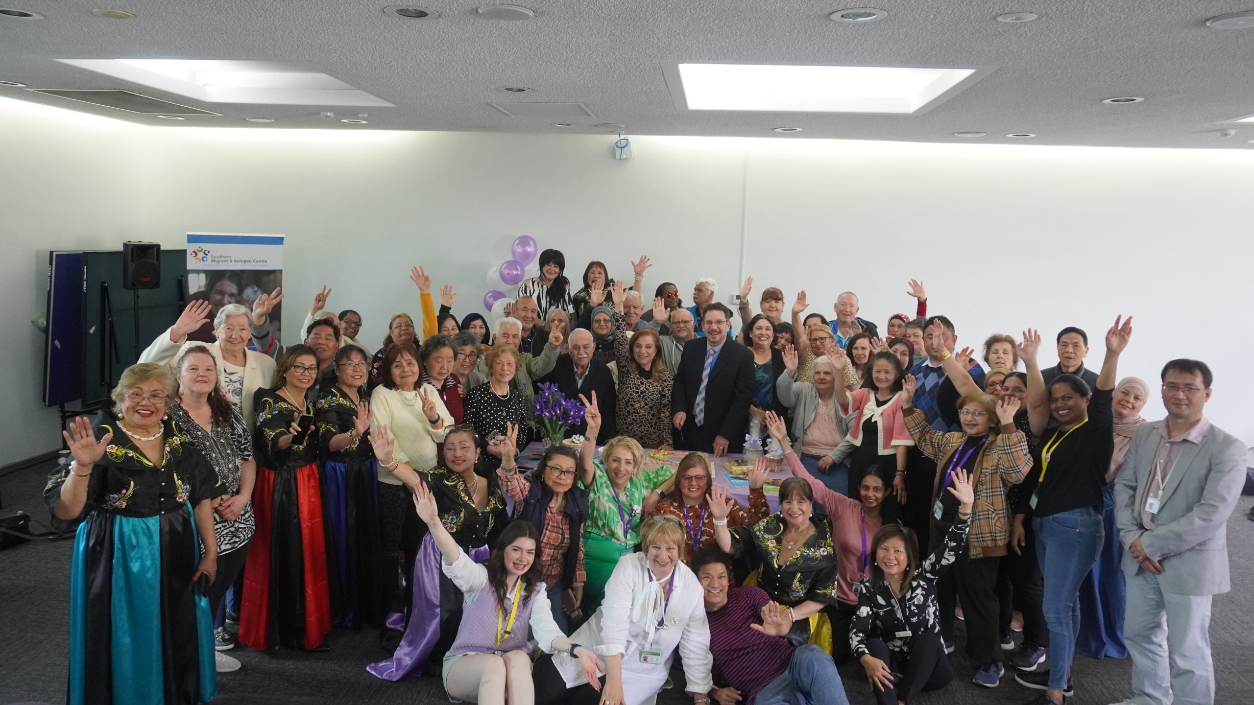 Carers Week recognises and celebrates carers and their outstanding role. People cheering for a photo