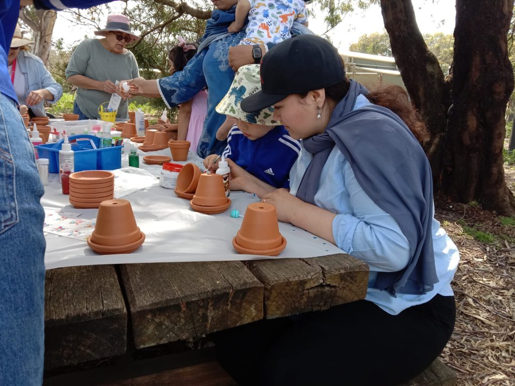 HIPPY family painting terracotta pots