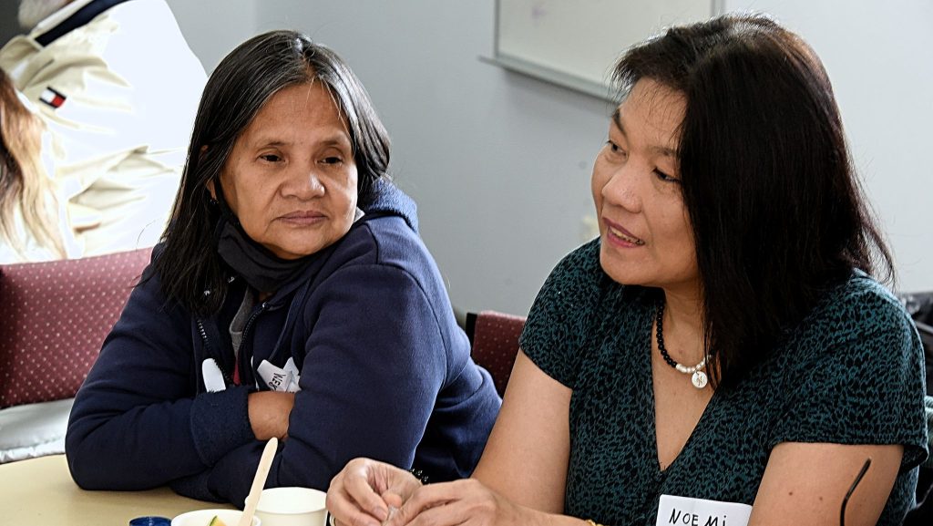 Two participants talking and listening