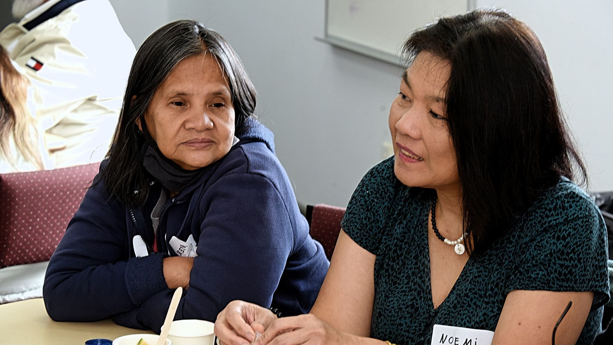 Two participants talking and listening