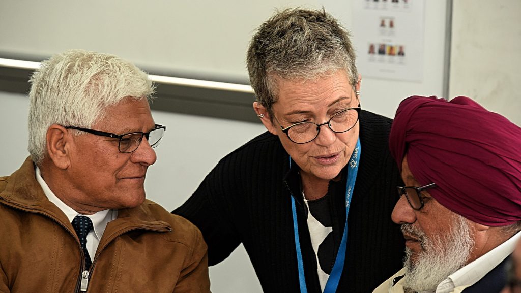 Two participants and an SMRC staff speaking