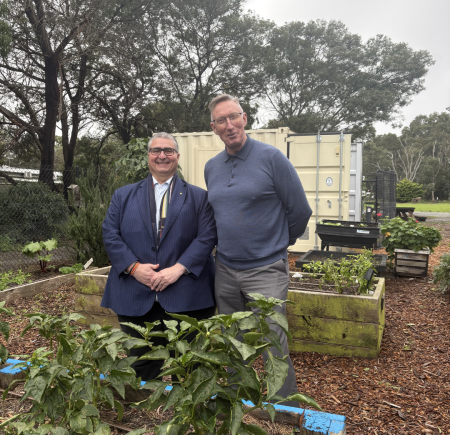 Lee Tarlamis MP and SMRC CEO Jim Mullan standing together in The Hive smiling at the camera Image