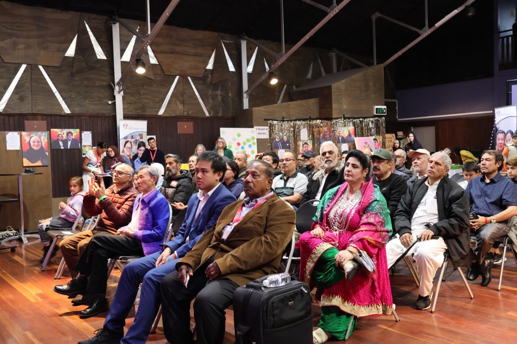 A crowd of people in a hall