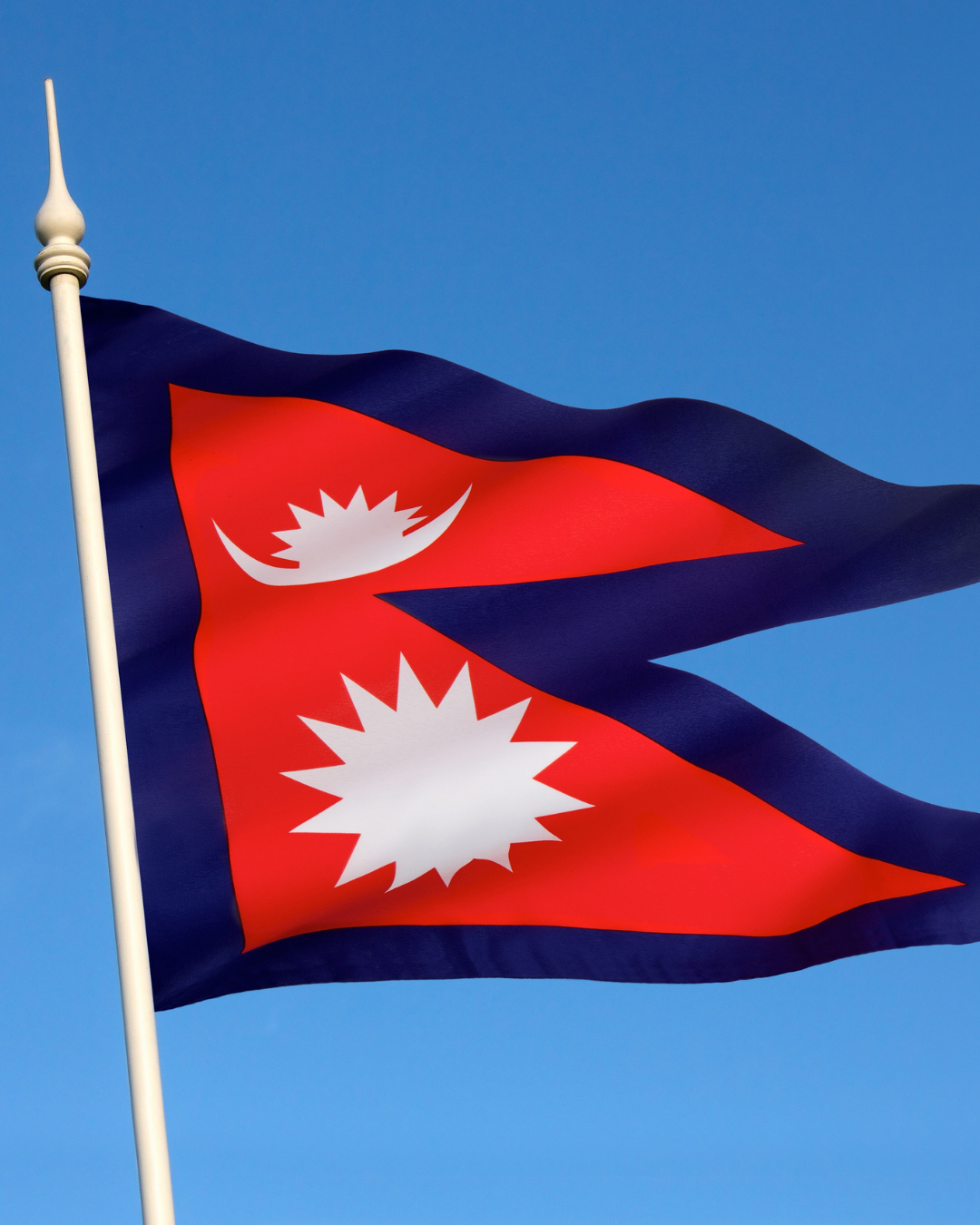 Nepalese flag against a blue background